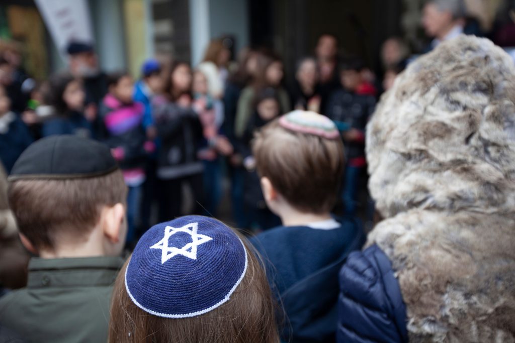 People gathered for a Jewish religious ceremony